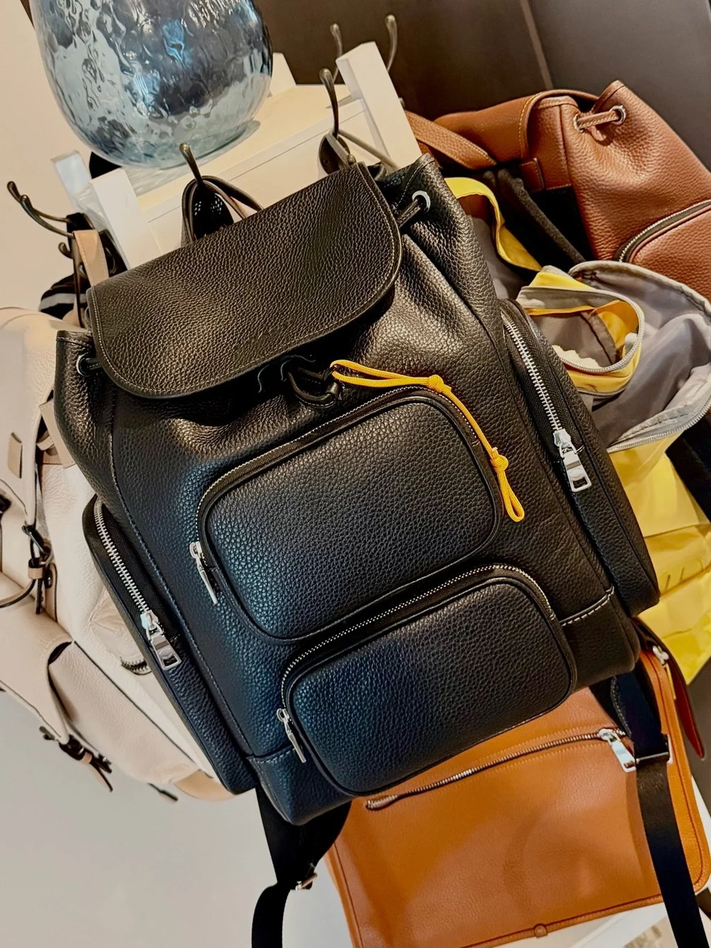 Coach Black Leather Backpack with Yellow Zip Pull